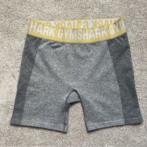 *NWOT-Size L- Gymshark Flex Shorts. Charcoal grey w/ amedallion yellow waistband